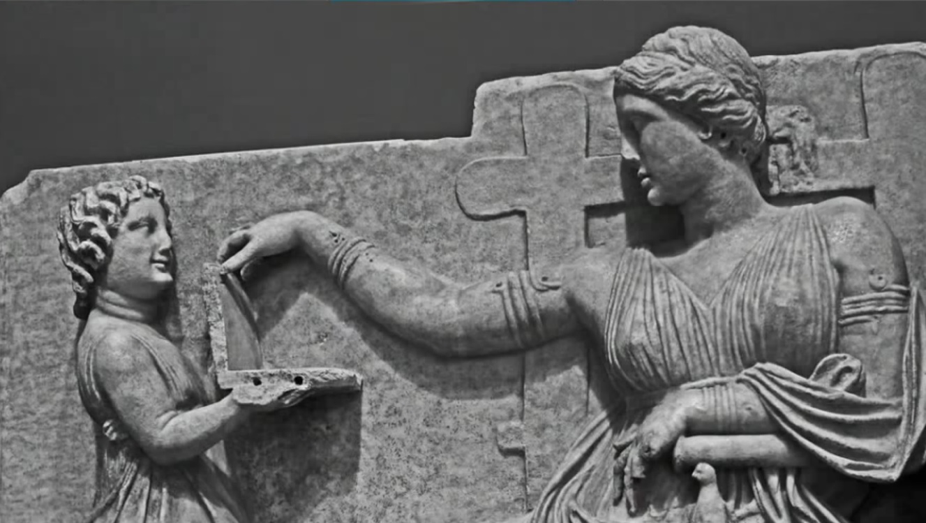 VIDEO: DOKAZ PUTOVANJA KROZ VRIJEME - Grčka skulptura na kojoj dijete drži laptop 1